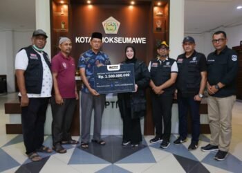 Illiza Serahkan Donasi APEKSI untuk Korban Bencana di Lhokseumawe dan Langsa